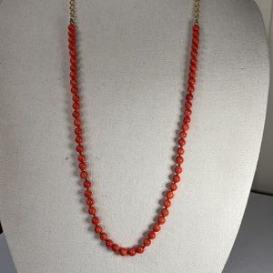 Gorgeous long petite round stone orange necklace